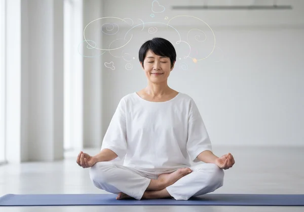 Person practicing mindfulness to calm anxious thoughts